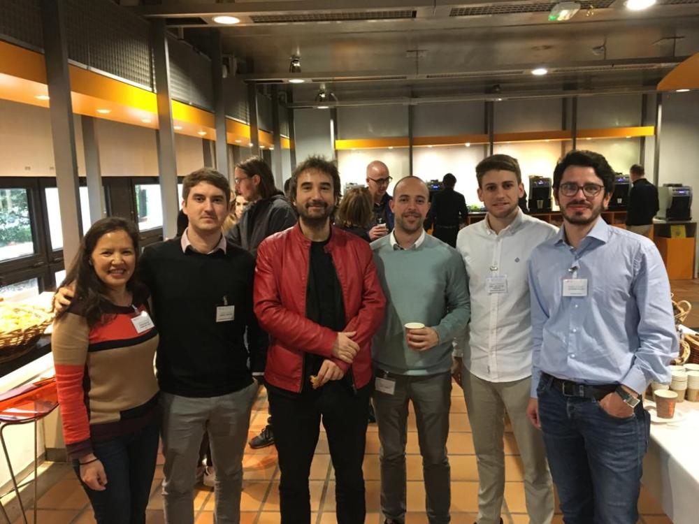 A group of colleagues posing in an office
